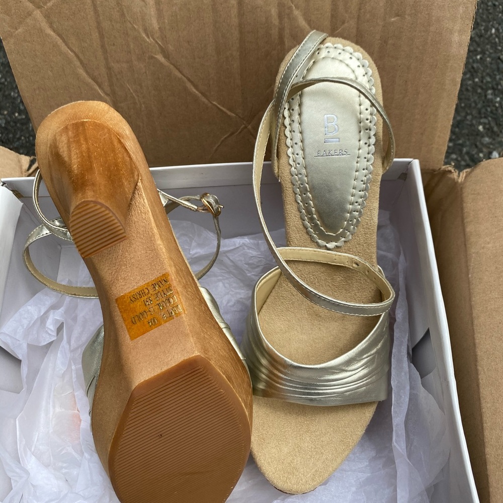 Gold shoes with a 5 in heel and a 1 in platform